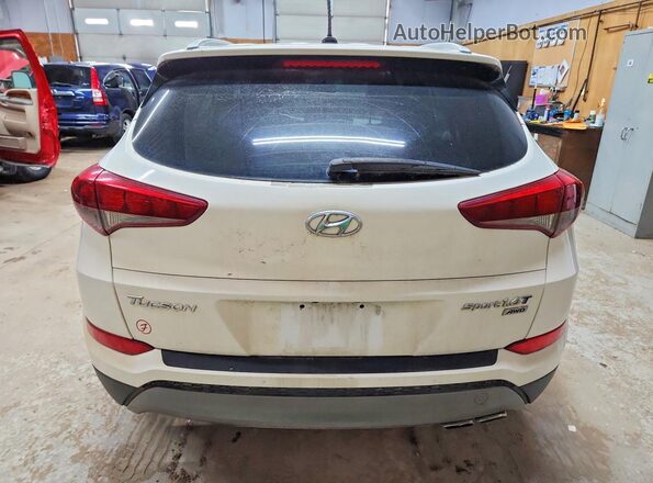 KM8J3CA22GU233597 2016 HYUNDAI TUCSON Белый Вид салона спереди