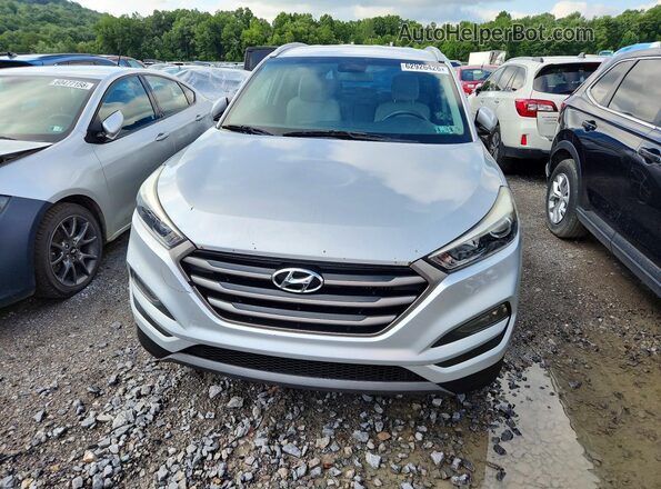 KM8J3CA20GU170581 2016 HYUNDAI TUCSON Silver უკანა ხედი