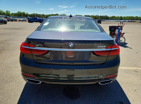 WBA7F2C53GG420172 2016 BMW 7 SERIES Gray Vista interior delantera
