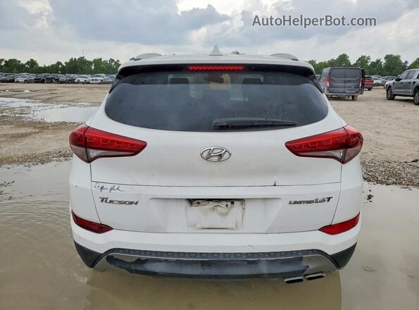 KM8J33A23GU268603 2016 HYUNDAI TUCSON White Front interior view