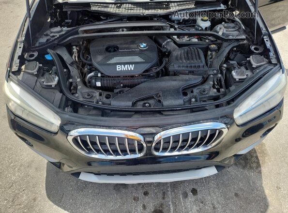 WBXHT3Z37H4A53653 2017 BMW X1 Black Вид наклейки з VIN-кодом