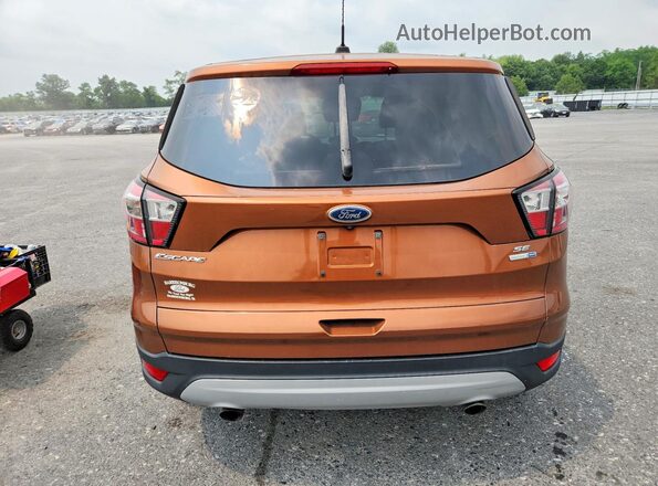 1FMCU9GD2HUD91831 2017 FORD ESCAPE Коричневый Вид салона спереди