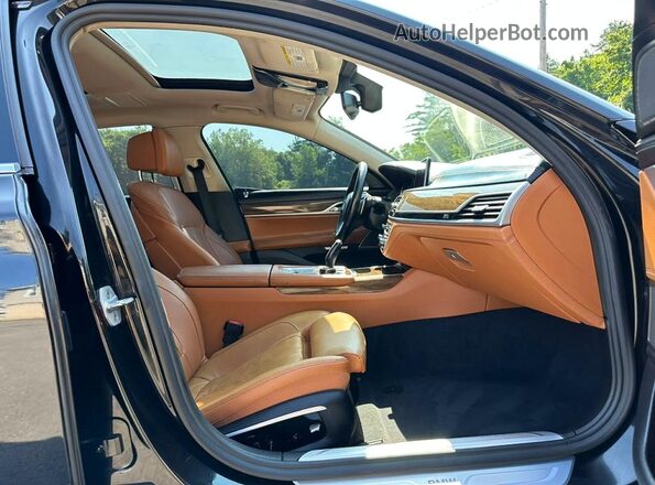 WBA7E4C53HGU99360 2017 BMW 7 SERIES Black Widok tylnych siedzeń