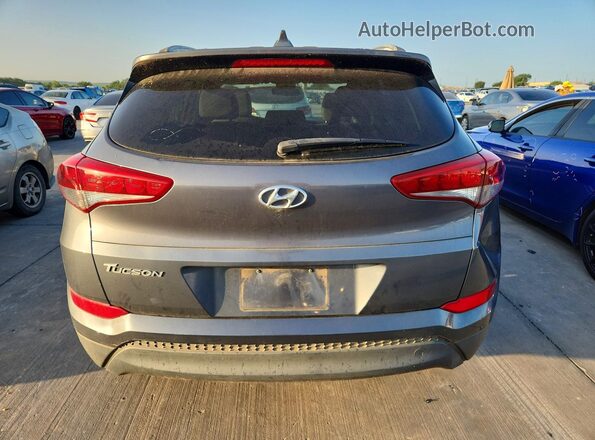 KM8J33A45JU663617 2018 HYUNDAI TUCSON Gray Front interior view