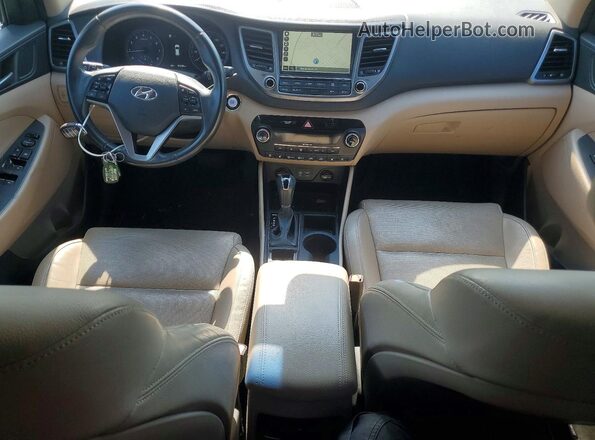 KM8J3CA27GU134256 2016 HYUNDAI TUCSON Black Vista del cuadro de instrumentos