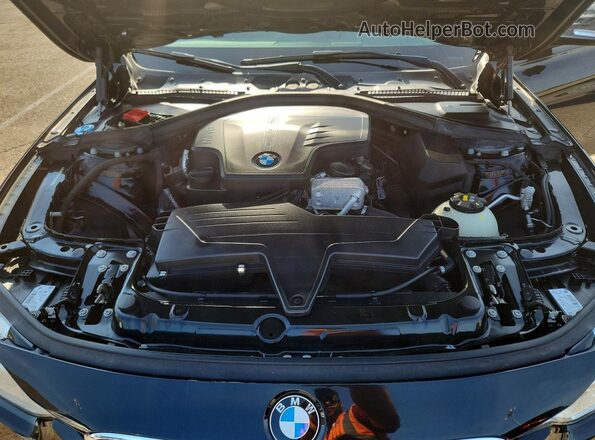 WBA8E5G5XJNU47102 2018 BMW 3 SERIES Black Vista del compartimento del motor