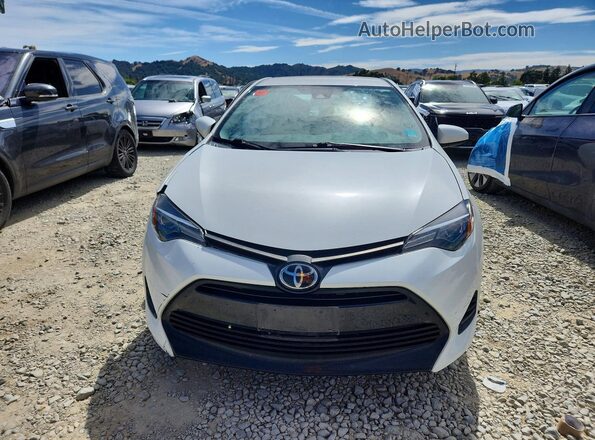 5YFBURHE5KP941857 2019 TOYOTA COROLLA Белый Вид сзади