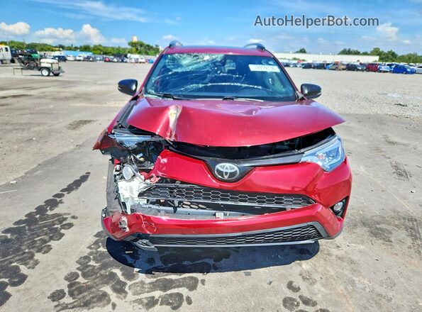 JTMNFREV0JD124681 2018 TOYOTA RAV4 Red Rear view