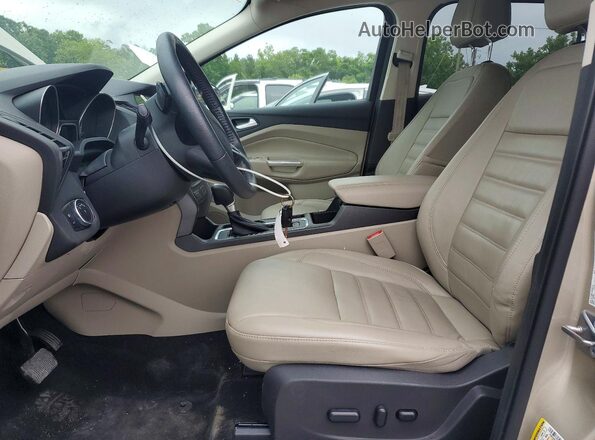 1FMCU9GD2HUA57542 2017 FORD ESCAPE Beige Vista del salpicadero