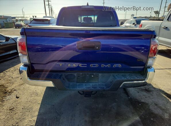 3TMAZ5CN2PM200187 2023 TOYOTA TACOMA Blue Vista interior delantera