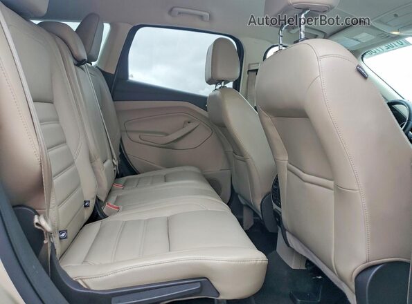 1FMCU9GD2HUA57542 2017 FORD ESCAPE Beige Vista interior trasera