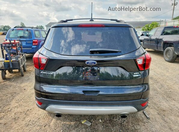 1FMCU9HD2KUB32469 2019 FORD ESCAPE Black Вид салону спереду