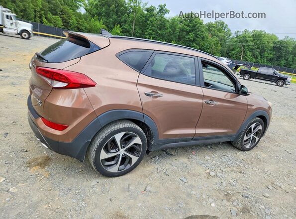 KM8J3CA22GU041905 2016 HYUNDAI TUCSON Brown Front right