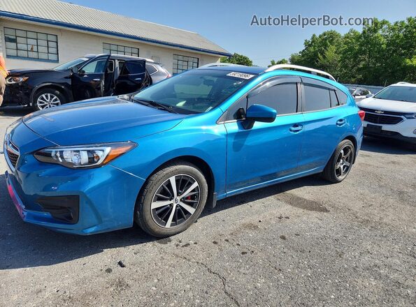 4S3GTAC67K3716374 2019 SUBARU IMPREZA Blue Trasero izquierdo