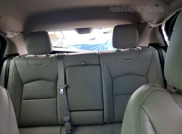 1GYFZCR43MF028086 2021 CADILLAC XT4 Blue Vista interior trasera