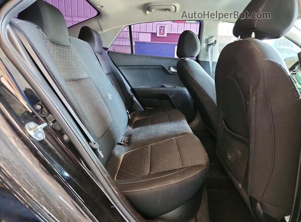 3KPA24AD4PE616535 2023 KIA RIO Black უკანა სალონის ხედი