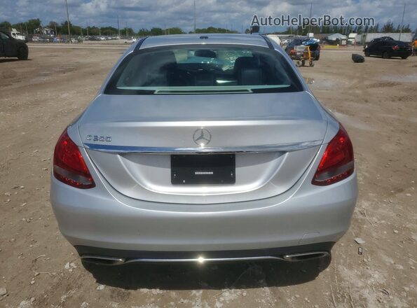55SWF4JB1GU173679 2016 MERCEDES-BENZ C Серебряный Вид сзади