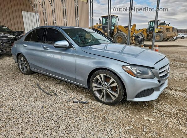 55SWF4JB3JU243822 2018 MERCEDES-BENZ C Blue Front right