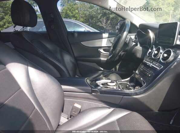 55SWF4JB7GU105306 2016 MERCEDES-BENZ C-CLASS Black Front interior view