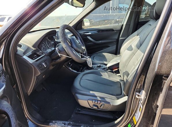 WBXHT3C34G5E55714 2016 BMW X1 Black Widok deski rozdzielczej