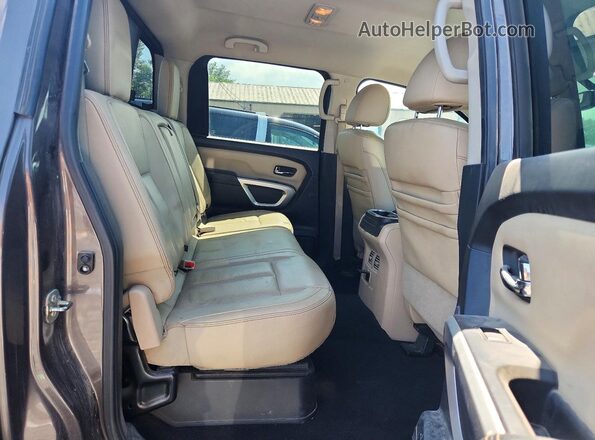 1N6BA1F48GN502769 2016 NISSAN TITAN Серый Вид задней части салона