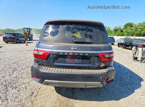 JN8AY2BA6M9372690 2021 NISSAN ARMADA Blue Vista interior delantera