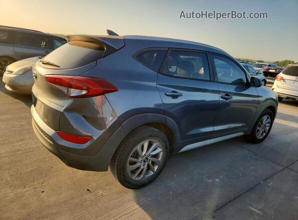 KM8J33A45JU663617 2018 HYUNDAI TUCSON Gray Front right