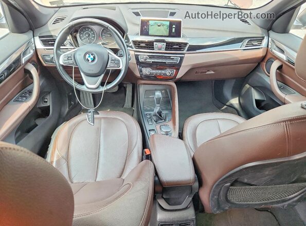 WBXHU7C3XH5H32940 2017 BMW X1 Brown Вид щитка приладів