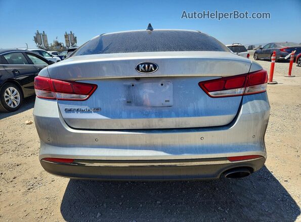 5XXGT4L37KG326950 2019 KIA OPTIMA Серебряный Вид салона спереди