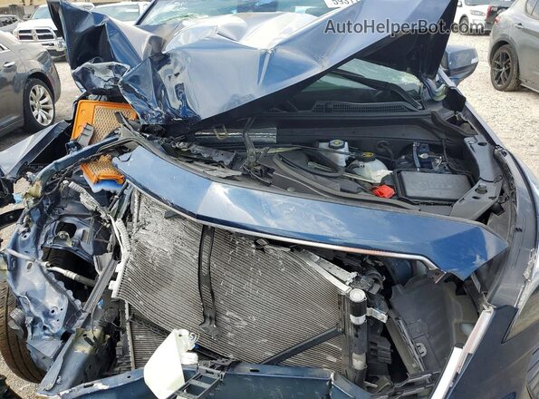 1GYFZCR43MF028086 2021 CADILLAC XT4 Blue Vista de la etiqueta del VIN