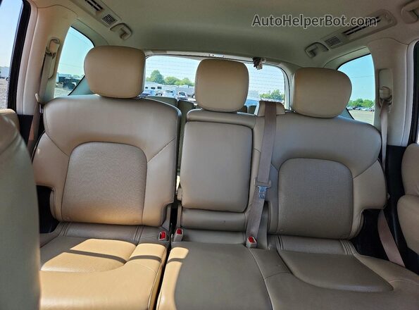 JN8AY2NC2J9556050 2018 NISSAN ARMADA Black Vista interior trasera