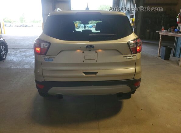 1FMCU9JD7HUF07629 2017 FORD ESCAPE Beige Vista interior delantera