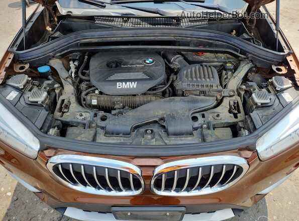 WBXHU7C3XH5H32940 2017 BMW X1 Brown Вид наклейки з VIN-кодом
