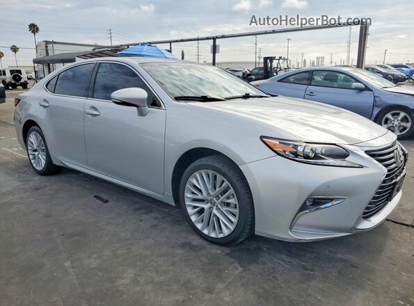 58ABK1GG8HU064288 2017 LEXUS ES Серебряный Передняя правая четверть