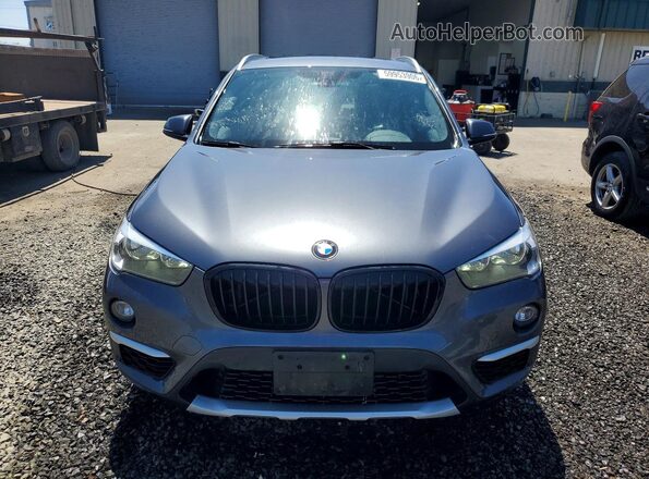 WBXHT3C31G5F64616 2016 BMW X1 Gray Հետևի տեսք