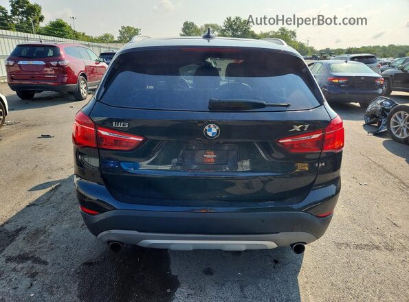 WBXHT3C33G5E47698 2016 BMW X1 Black Սալոնի դիմացի տեսք