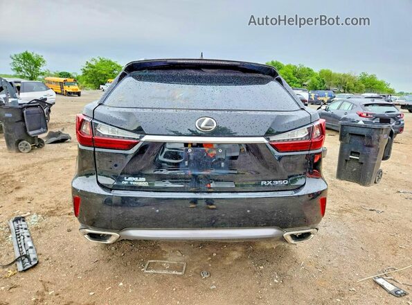 2T2BZMCA3GC033693 2016 LEXUS RX Черный Вид салона спереди