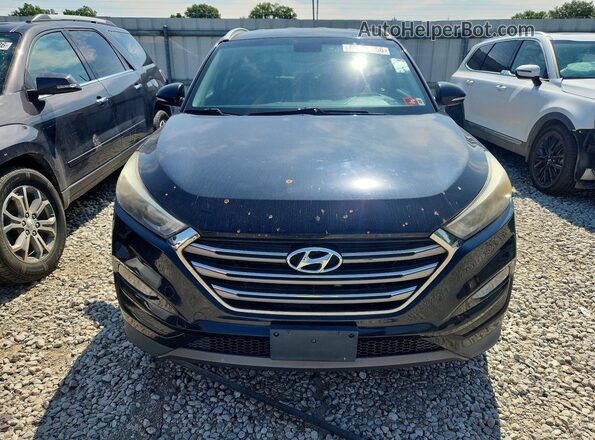 KM8J3CA24GU145960 2016 HYUNDAI TUCSON Black უკანა ხედი