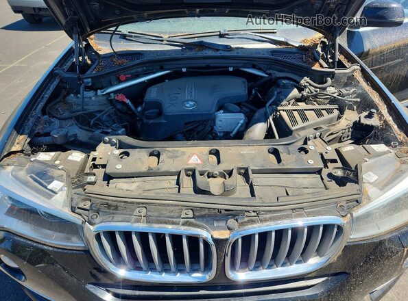 5UXXW3C51G0M90320 2016 BMW X4 Black Vista del compartimento del motor