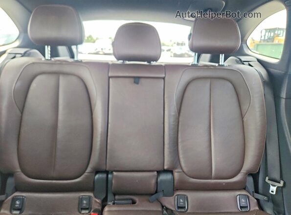WBXHT3Z37H4A53653 2017 BMW X1 Black Вид задньої частини салону