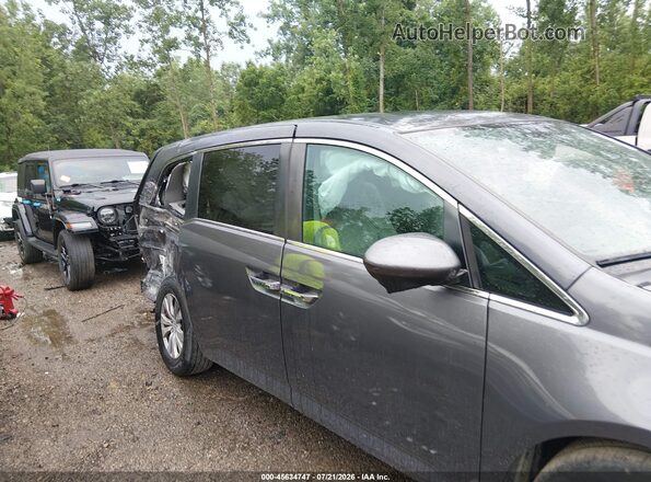 5FNRL5H41GB094825 2016 HONDA ODYSSEY Gray Widok wnętrza z tyłu
