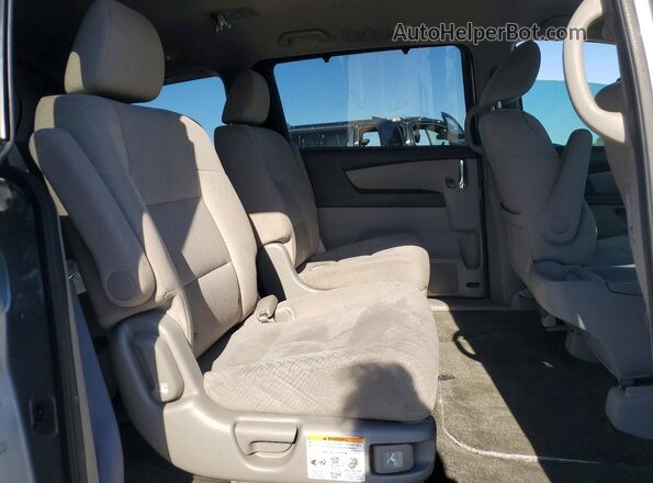 5FNRL5H41GB162735 2016 HONDA ODYSSEY Silver Rear seats view