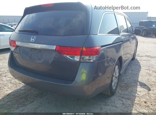 5FNRL5H67GB043587 2016 HONDA ODYSSEY Gray Trasero derecho