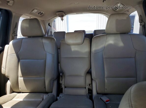 5FNRL5H68GB112237 2016 HONDA ODYSSEY Maroon Rear seats view