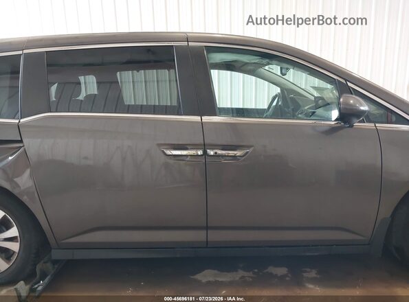5FNRL5H6XGB067575 2016 HONDA ODYSSEY Gray Widok wnętrza z tyłu