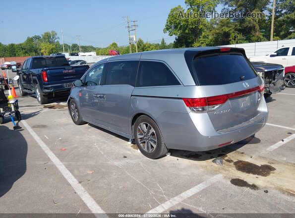 5FNRL5H99GB027675 2016 HONDA ODYSSEY Gray Trasero izquierdo