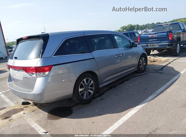 5FNRL5H99GB027675 2016 HONDA ODYSSEY Gray Trasero derecho