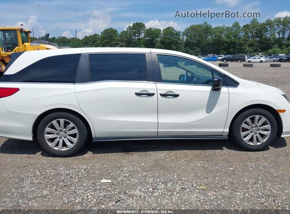 5FNRL6H29JB107672 2018 HONDA ODYSSEY White Rear interior view