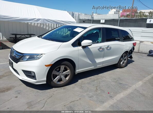 5FNRL6H59JB101557 2018 HONDA ODYSSEY Белый Передняя левая четверть