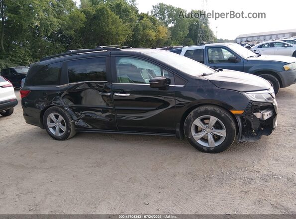 5FNRL6H70JB098002 2018 HONDA ODYSSEY Black Սալոնի հետևի տեսք